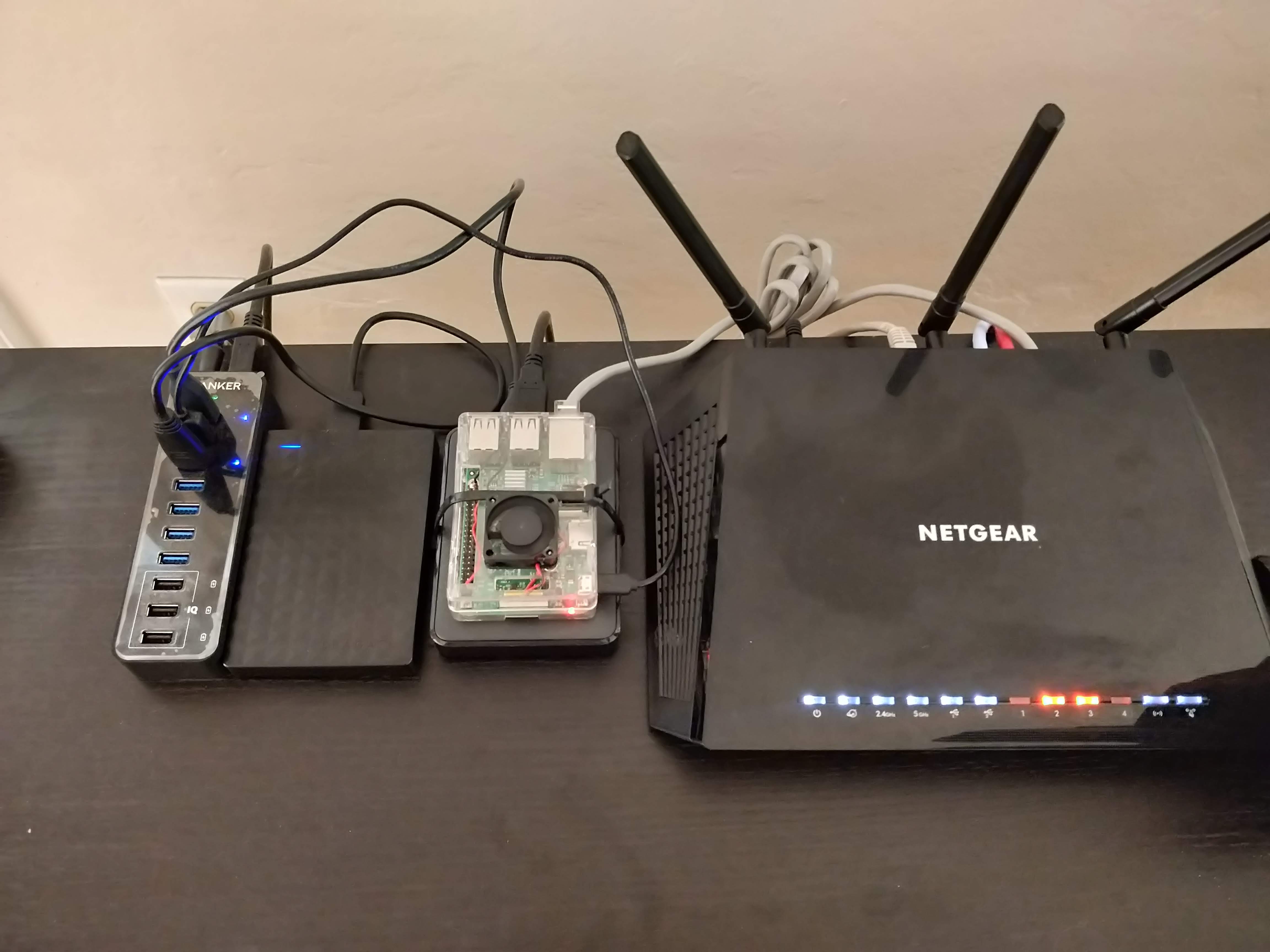 Raspberry Pi connected to Netgear Router and to USB drives.
